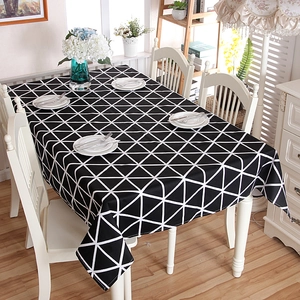 Modern minimalist black canvas tablecloth with white geometric triangle patterns