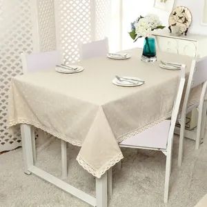 Rectangle beige linen tablecloth with white floral pattern and lace trim for home decor