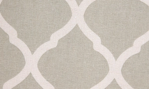 Macro shot of grey geometric diamond pattern on high-quality cotton lace tablecloth