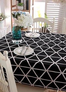 Close-up of black and white geometric triangle pattern on thick cotton canvas tablecloth
