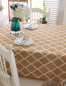 Detailed texture of cotton linen tablecloth with yellow geometric lattice pattern
