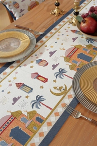 Macro detail of Eid Ramadan table runner featuring golden mosques and stars on jacquard fabric