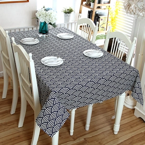Detail of Japanese Seigaiha wave pattern tablecloth with decorative lace edges