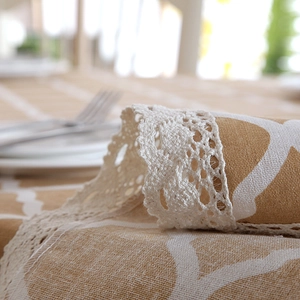 Modern yellow geometric tablecloth with elegant white lace borders for dining tables
