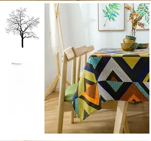 Detail of bohemian geometric V-shape pattern on thick cotton canvas tablecloth fabric
