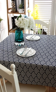 Detailed view of Japanese navy blue wave pattern tablecloth with elegant lace edge