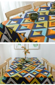 Detail of a geometric V-pattern thick cotton canvas tablecloth for coffee and dining tables