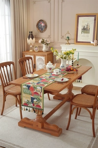 Detail of jacquard table runner with Middle Eastern architecture motifs and tassels