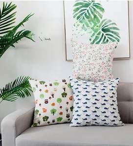 Close-up of Nordic style cotton linen cushion covers with floral and animal prints