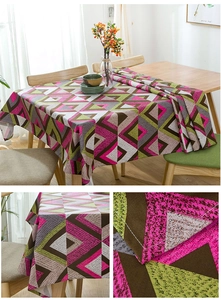 Detailed close-up of geometric V-pattern cotton canvas tablecloth with neat stitching