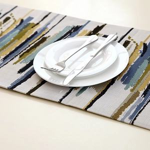 Detail of colorful abstract oil paint stroke pattern on high-quality woven fabric runner