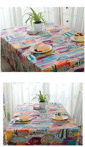 Detail of colorful tropical fish print on thick cotton tablecloth for dining room decor