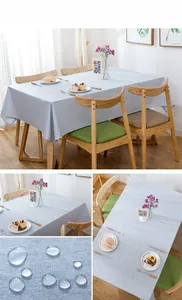 Detail of light blue linen rectangular tablecloth with waterproof droplet feature