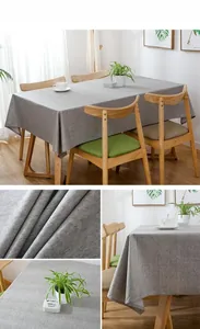 Detail of grey waterproof linen tablecloth with textured fabric on a rectangular table