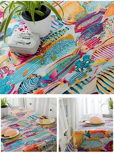 Detail view of tropical fish print on thickened cotton tablecloth with vibrant sea patterns