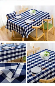 Close-up of modern dark blue plaid tablecloth showing fine stitching and linen texture
