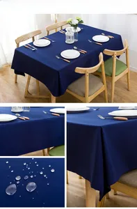 Close-up of navy blue rectangular tablecloth showing waterproof fabric and textured weave