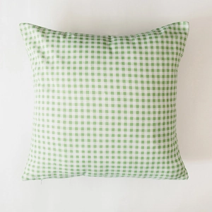 Detailed close-up of a green and white plaid cotton-linen square pillow cover with zipper