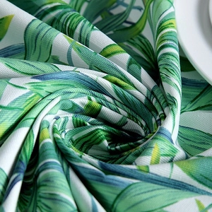 Thick cotton canvas tablecloth with tropical green palm leaf pattern on white fabric