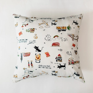 Detailed view of Nordic cotton-polyester pillow cover with cartoon London bus and cat print