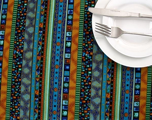 Detailed close-up of vibrant Southeast Asian ethnic stripe tablecloth with lace trim