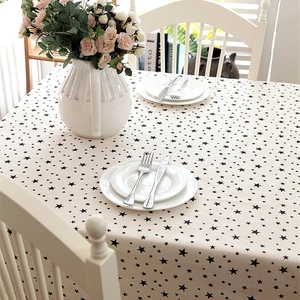 Modern minimalist beige rectangle tablecloth with black star pattern for home dining decor
