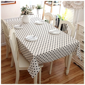 Modern minimalist rectangle tablecloth with black polka dots on natural white cotton fabric