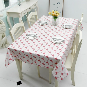 Polyester-cotton flamingo print tablecloth for dining and coffee tables in a clean setting