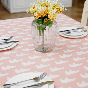 Pink rectangular tablecloth with white polar bear print in a soft cotton linen texture