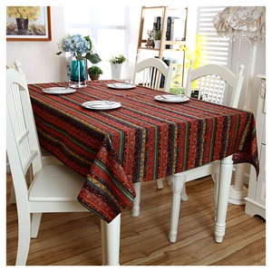 Ethnic bohemian style table cloth with gold-stamped stripes and vibrant floral patterns
