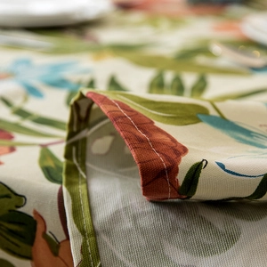 Close-up of tropical leaf print on thick cotton canvas with double-stitched hem finish