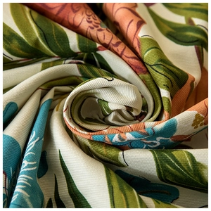 Thick cotton canvas tablecloth featuring tropical green leaves and floral pattern print