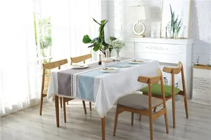 Detailed view of Nordic geometric jacquard tablecloth with elegant lace edges