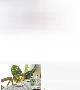 Detail of minimalist cotton-linen tablecloth with grey geometric triangle pattern