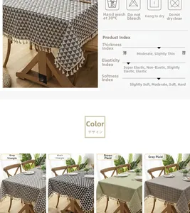 Detail of tassel fringe on modern cotton linen tablecloth with washing care instructions
