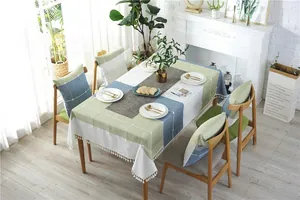 Detail of Nordic plaid tablecloth with fringe tassels and mixed color geometric pattern