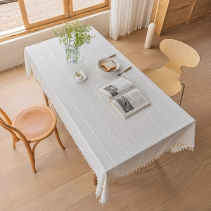 Linen rectangle tablecloth with vertical textured stripes and decorative tassel edge