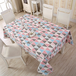 Overhead view of Nordic rectangular tablecloth with pink and blue geometric triangles