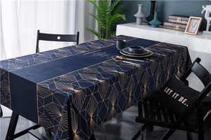 Detailed luxury velvet tablecloth with gold geometric patterns and Home Dream lettering