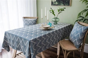 Detail showing blue chevron woven texture of waterproof Nordic tablecloth and pillow case