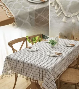 Detailed view of rectangle cotton linen tablecloth with elegant fringe tassels and patterns