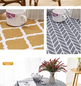 Detailed macro view of woven linen-cotton table cloth with tassel and geometric patterns