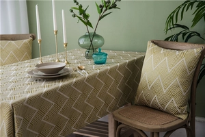 Detail of waterproof olive green wave pattern tablecloth and matching pillow cover decor