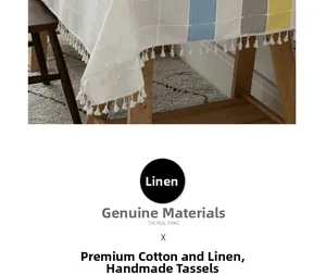 Macro detail of cotton linen tablecloth showing grey stripes and white fringe tassels