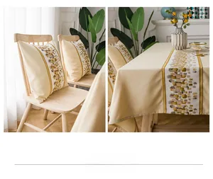 Close-up of waterproof faux linen table runner and cushion with abstract mosaic patterns