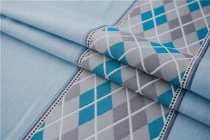 Macro shot of waterproof light blue faux linen fabric with grey geometric diamond pattern