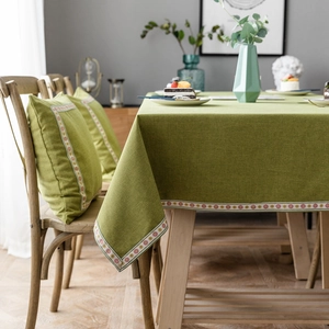 Olive green linen texture tablecloth set with floral lace border and matching cushions