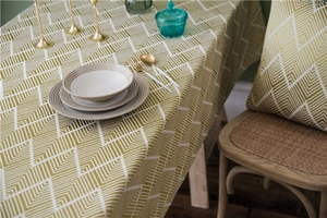 Close-up of waterproof wavy jacquard tablecloth with textured Nordic geometric patterns