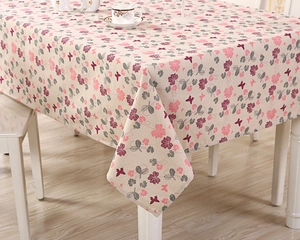 Detail of floral and butterfly print on fresh cotton linen blend rectangular tablecloth