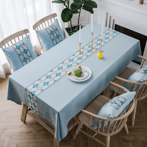 Waterproof faux linen tablecloth set with blue geometric diamond pattern runner and pillows